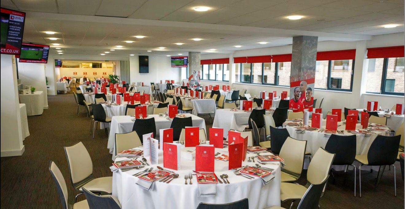 Hospitality suite prepared with round dining tables