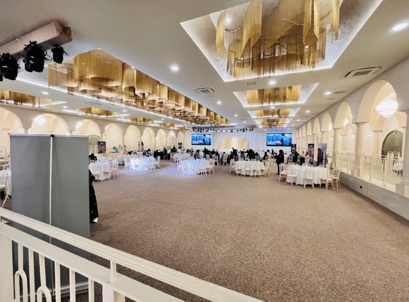 Grand hall arranged for a large reception, gala, or conference