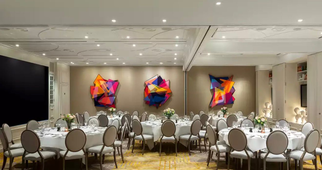 Modern private dining room with colorful wall art
