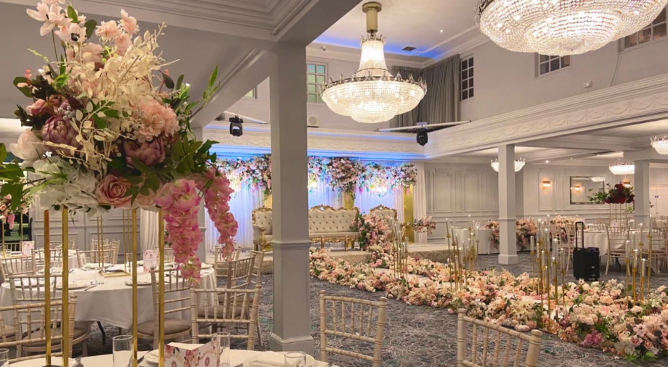 Pink floral ballroom with chandelier lighting